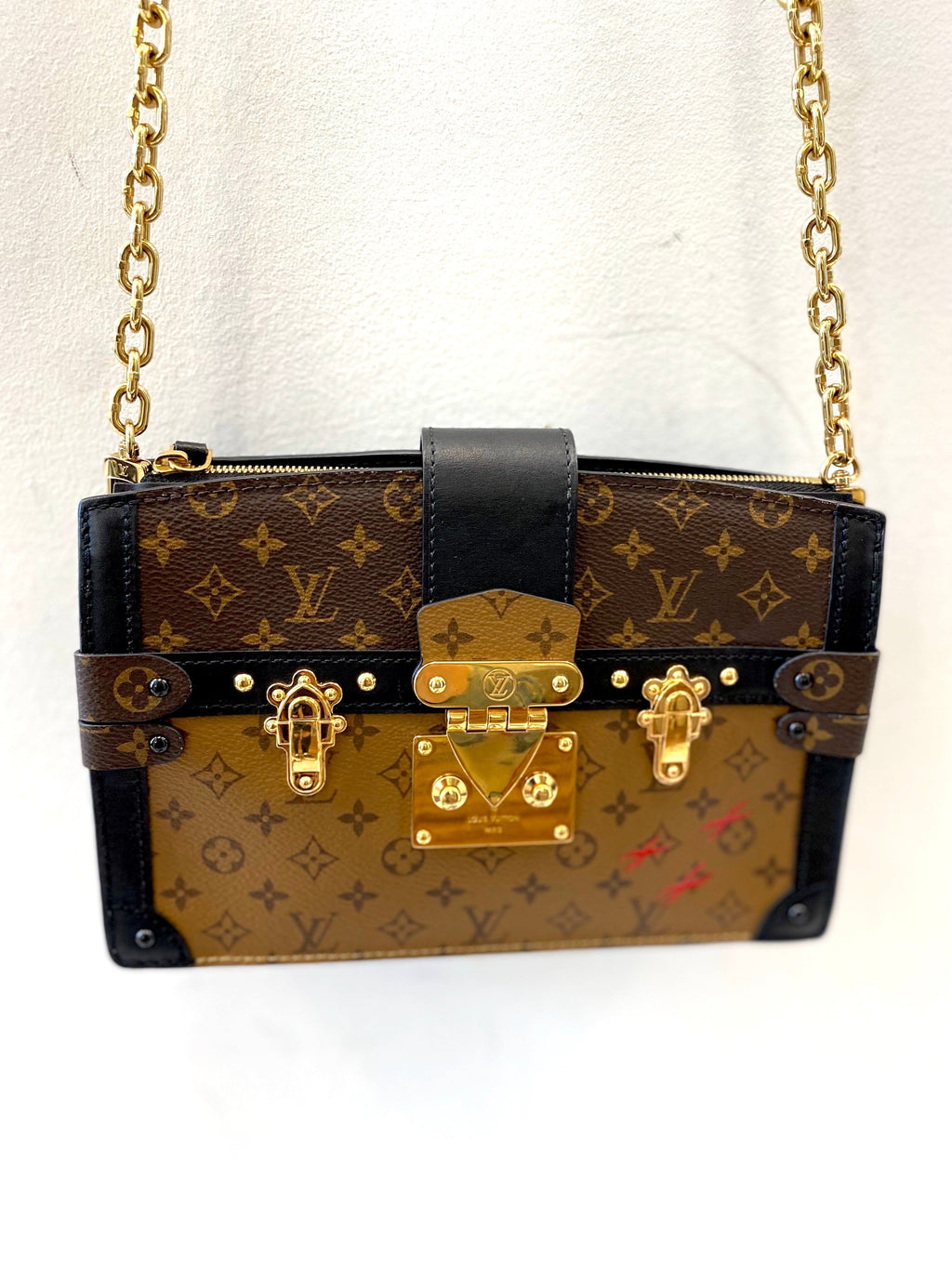 LOUIS VUITTON REVERSE MONOGRAM TRUNK CLUTCH BAG