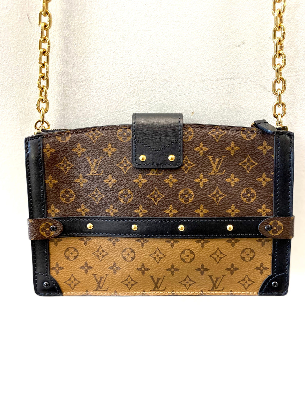 LOUIS VUITTON REVERSE MONOGRAM TRUNK CLUTCH BAG