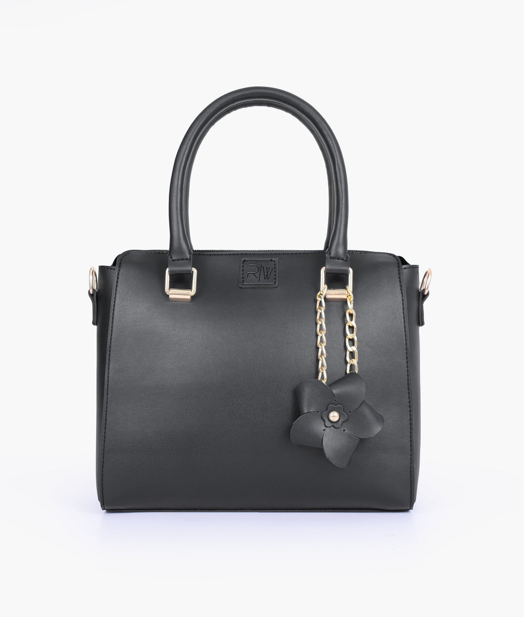 Black handbag with flower charm