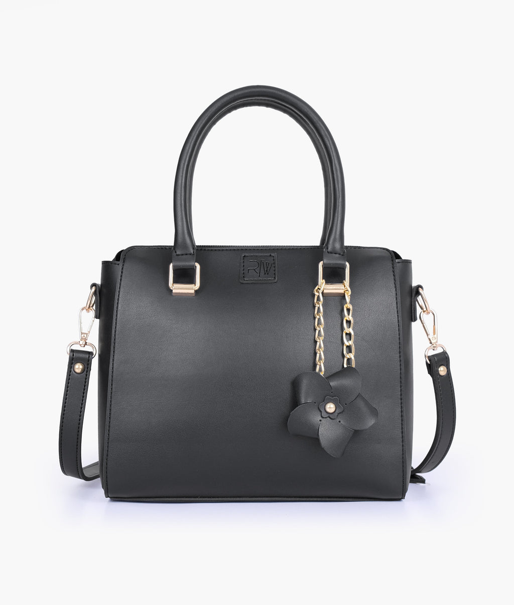 Black handbag with flower charm