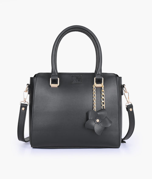 Black handbag with flower charm