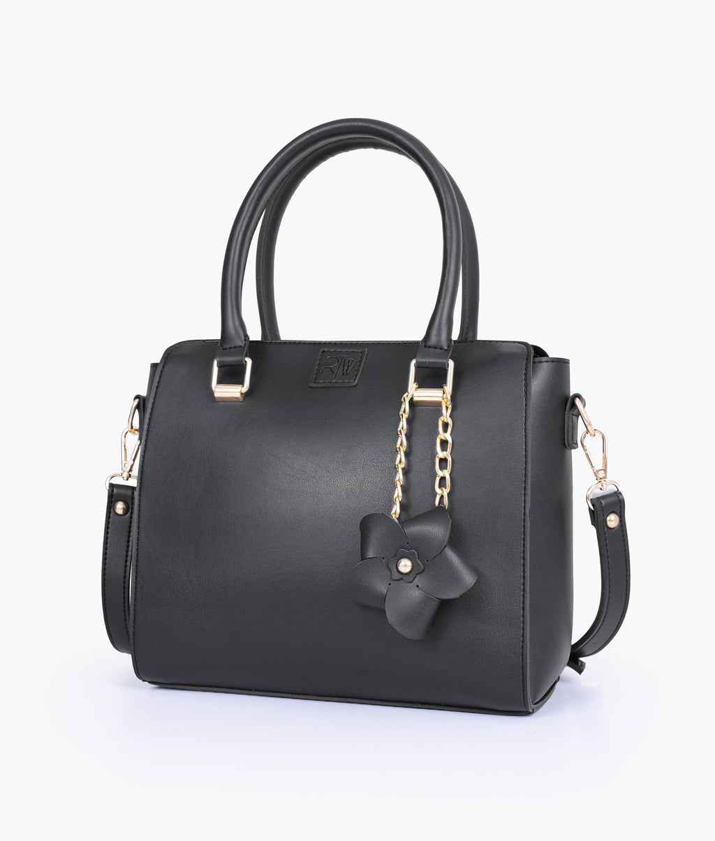 Black handbag with flower charm