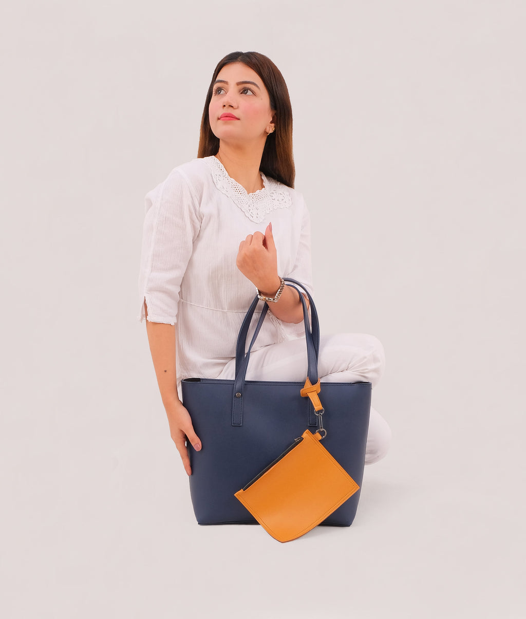 Blue tote bag with detachable pouch