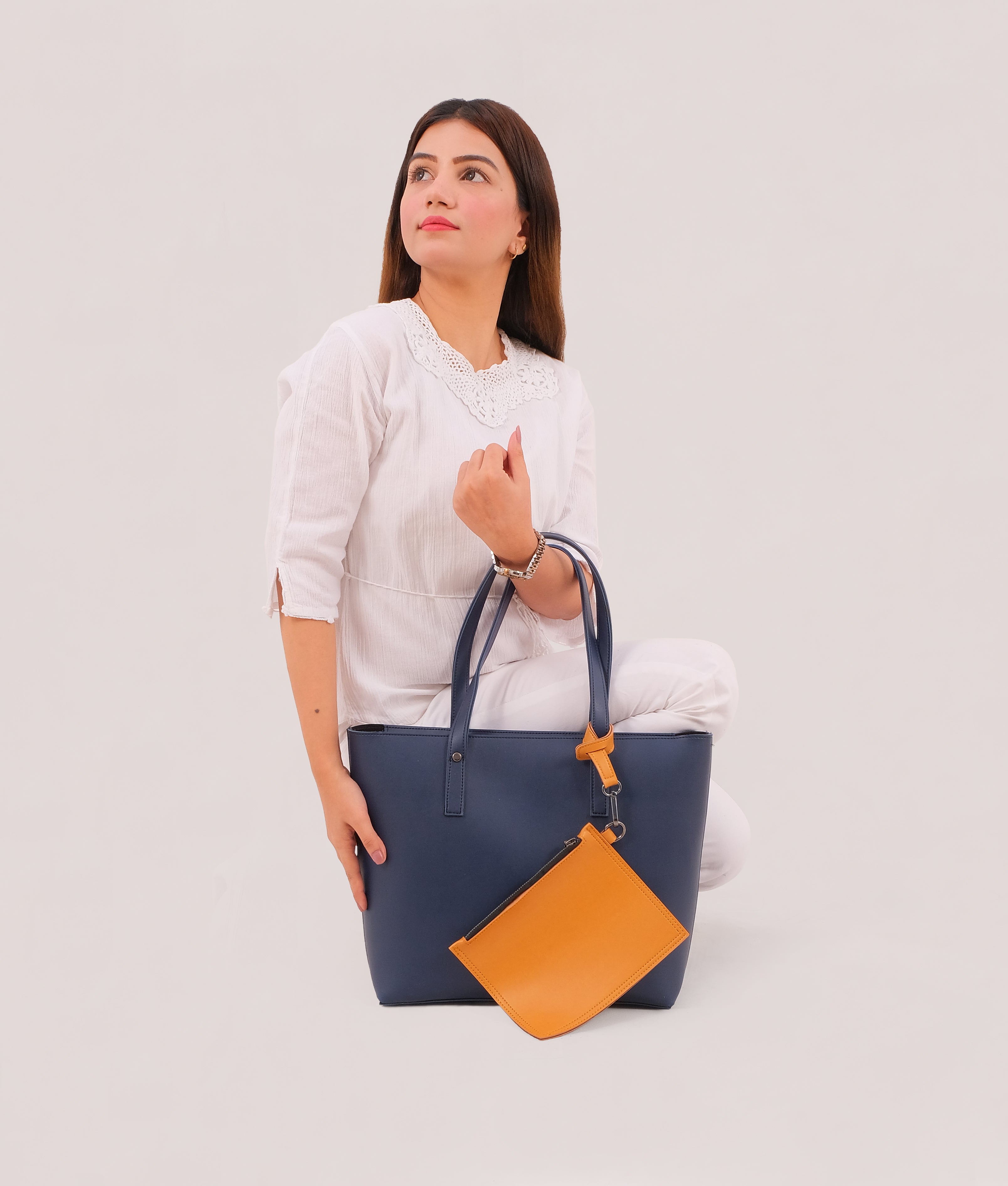 Blue tote bag with detachable pouch