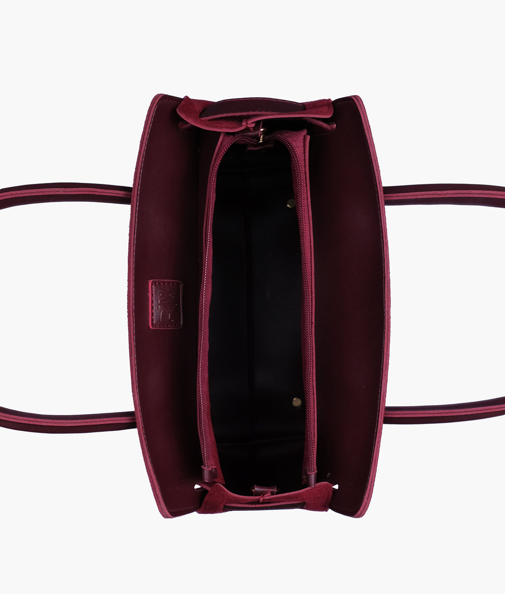 Burgundy suede handbag with front buckle