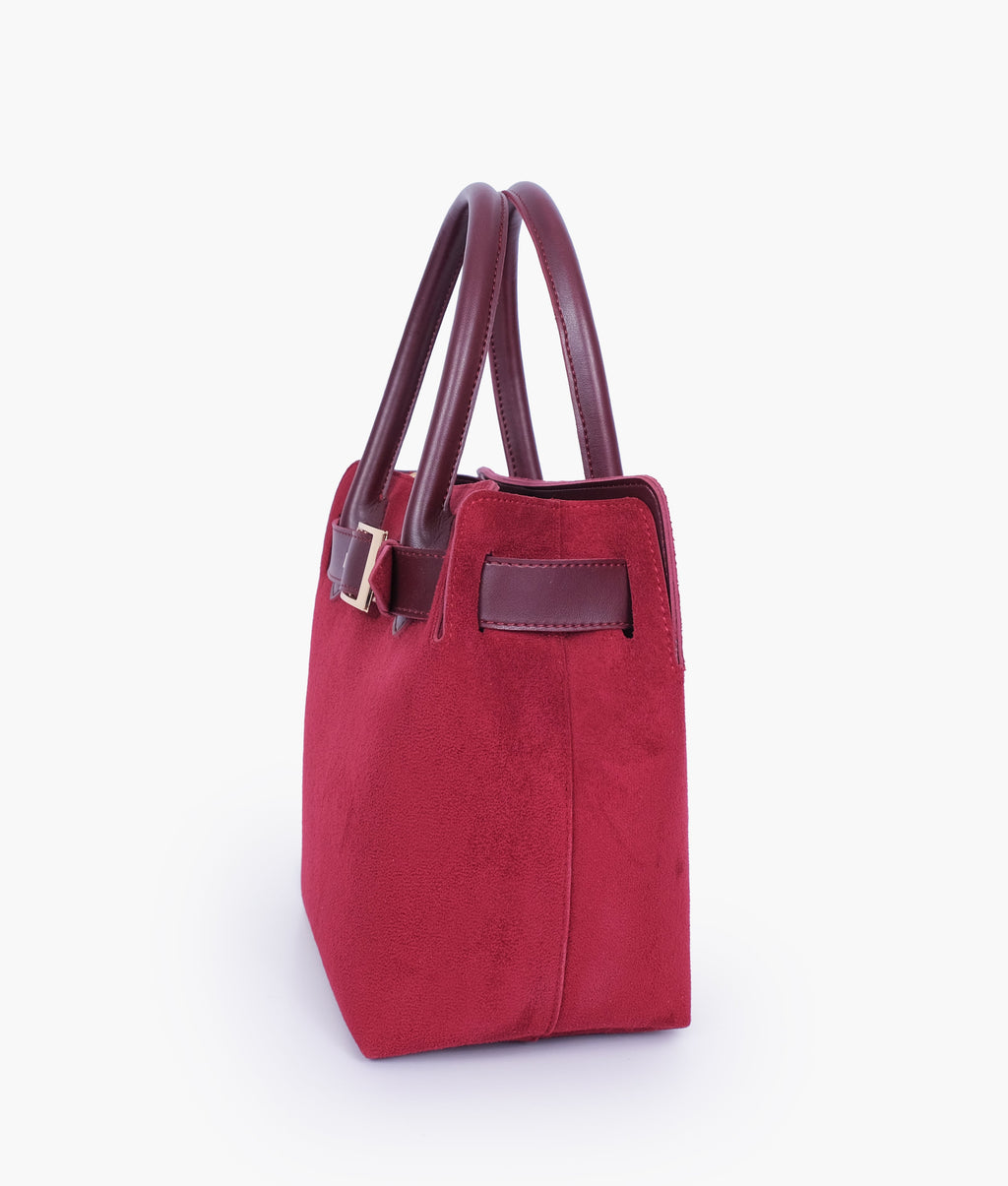 Burgundy suede handbag with front buckle