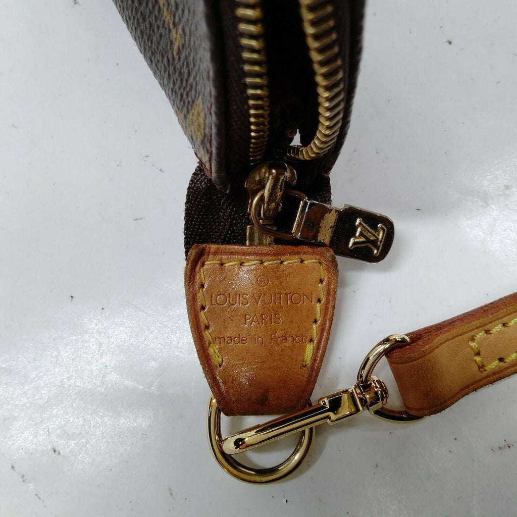 Louis Vuitton Pochette Accessoires Browns Monogram Hand Bag